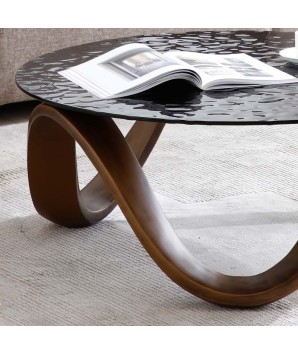 table basse ronde VANCOUVER design sculptural organique détail pied bois sinusoïdal plateau verre martelé